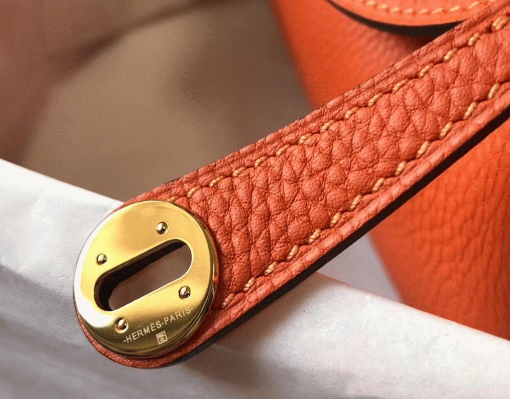 Replica Hermes Lindy Mini handbag in orange color angle 3