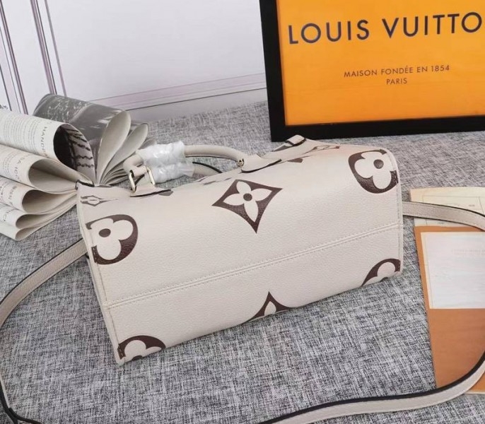 Louis Vuitton Bicolor Monogram Empreinte Leather Onthego PM Bag In Cream And Bois De Rose Pink angle 4