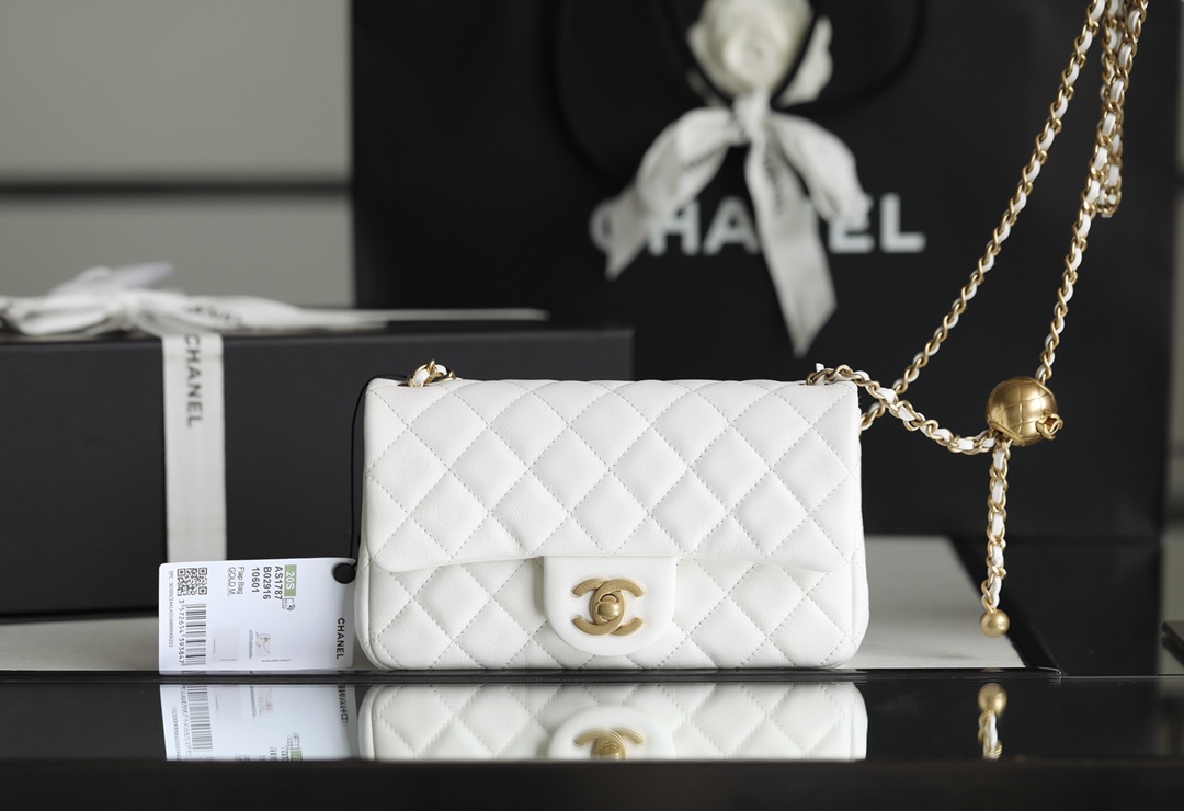 Chanel classic flap mini with golden ball