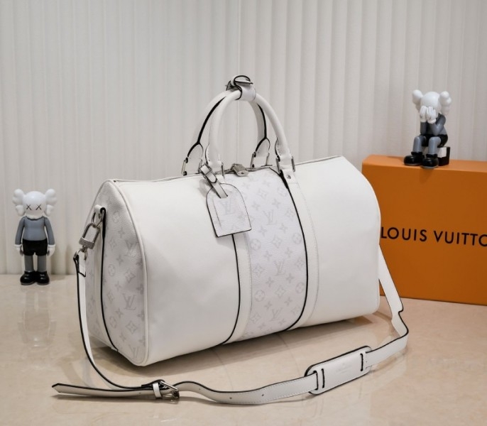 Louis Vuitton Taiga Leather Keepall Bandouliere 50 Travel Bag In White angle 2