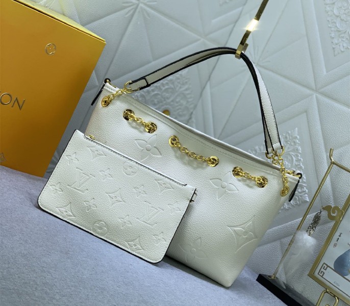 Louis Vuitton Monogram Empreinte Leather Bundle Bag In Cream angle 2