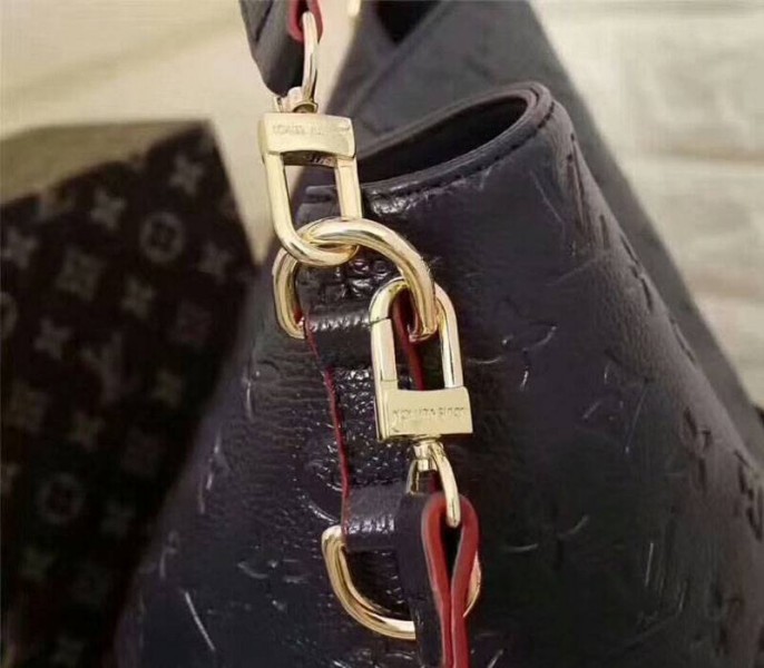 Louis Vuitton Monogram Empreinte Melie Hobo In Navy Blue angle 4