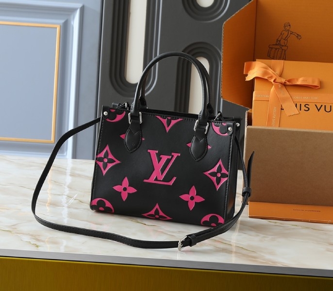 Monogram Empreinte OnTheGo PM Tote In Black And Magenta Pink angle 3