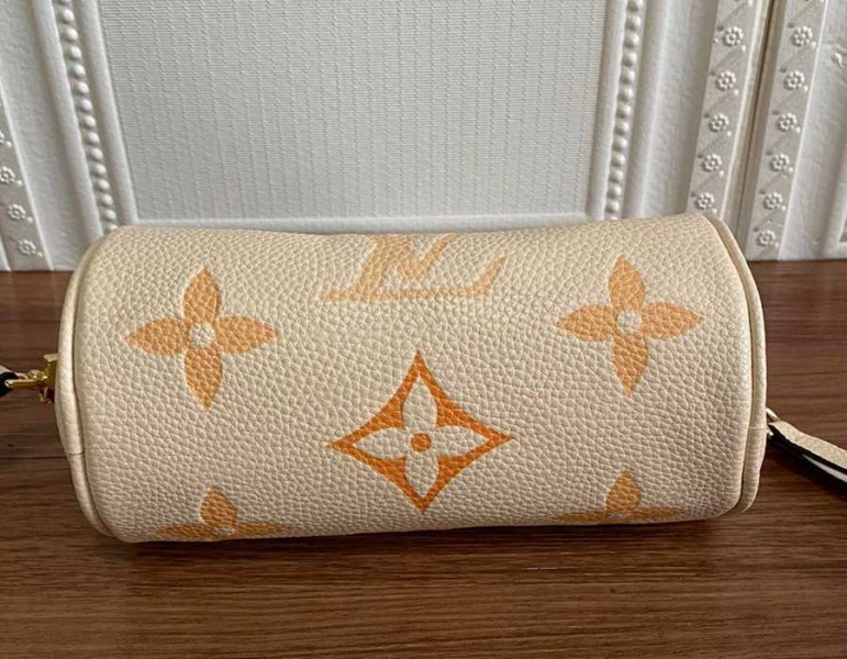 Louis Vuitton Bicolor Monogram Empreinte Papillon BB Bag In Cream And Saffron angle 4