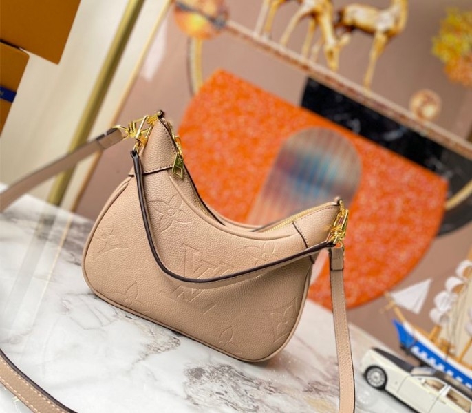 Louis Vuitton Monogram Empreinte Leather Bagatelle Mini Hobo In Beige