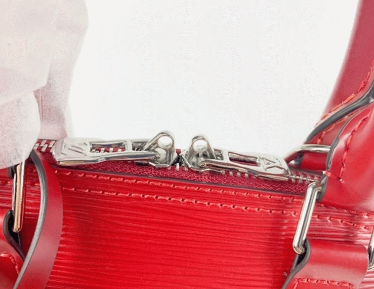 Louis Vuitton Epi Leather Alma BB Handbag In Red With Jacquard Strap angle 2