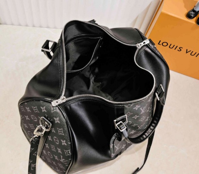 Louis Vuitton Taiga Leather Keepall Bandouliere 50 Travel Bag In Black angle 3