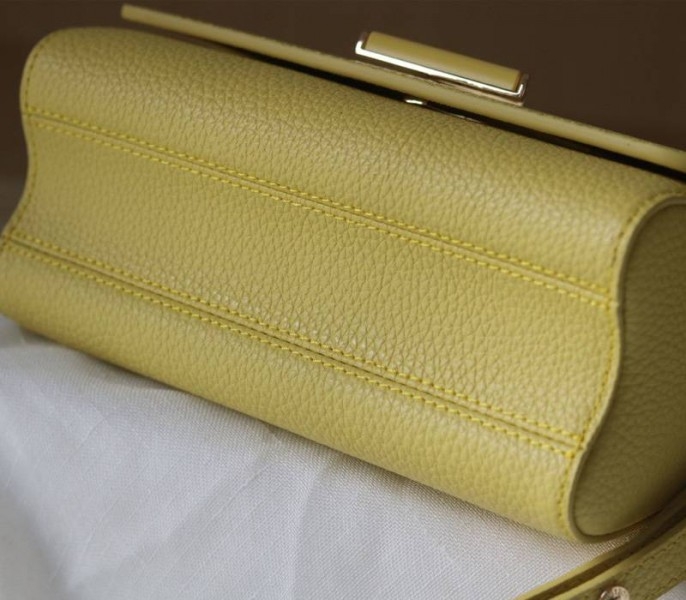 Louis Vuitton Taurillon Leather Twist MM Scrunchie Handle In Ginger Yellow angle 4