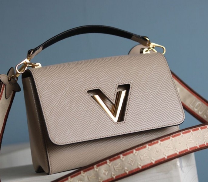 Louis Vuitton Epi Leather Twist MM Handbag In Galet Gray With Embroidered Strap angle 3
