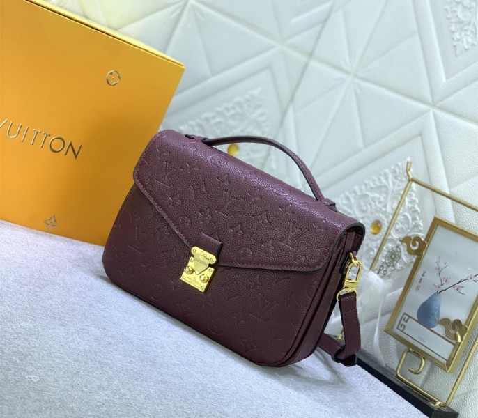LV Monogram Empreinte Leather Metis In Wine angle 2