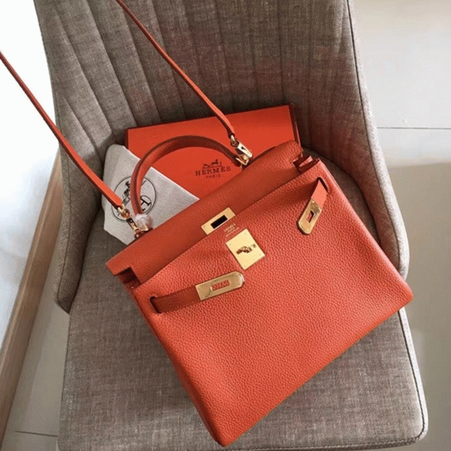 Orange Clemence Fake Hermes Kelly Retourne 28cm Signature Purse angle 4