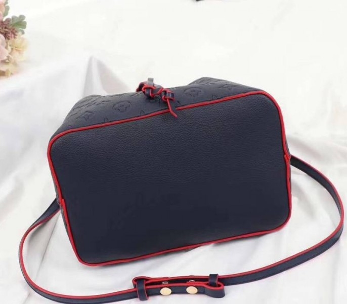 Louis Vuitton Monogram Empreinte NeoNoe MM Bag In Marine Rouge angle 4