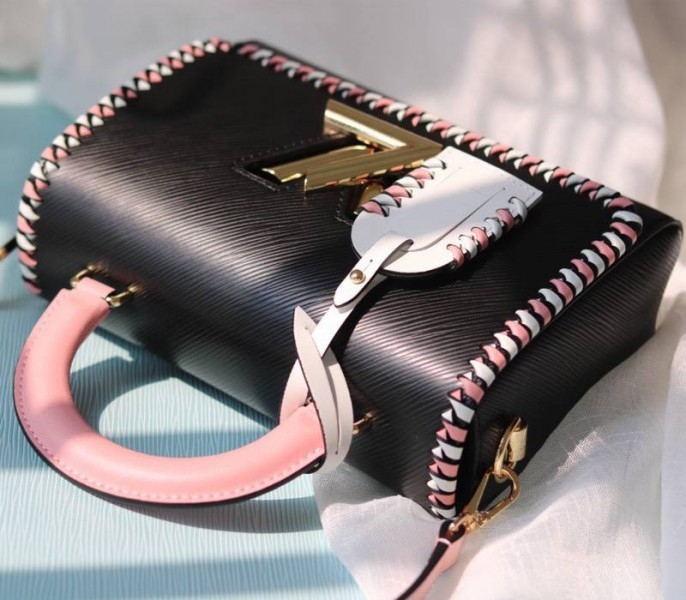 Louis Vuitton Epi Leather Twist MM Bag In Black With Braided Edges Flap angle 4