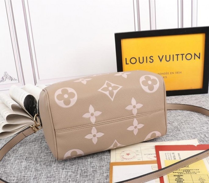 Louis Vuitton Bicolor Monogram Empreinte Leather Speedy Bandouliere 25 Handbag In Tourterelle Gray And Cream angle 4