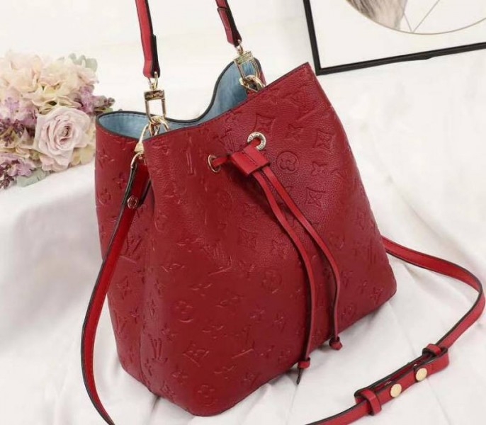 Louis Vuitton Monogram Empreinte NeoNoe MM Bag In Red angle 2