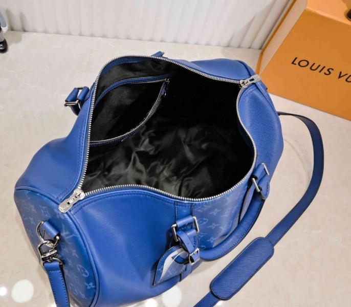 Louis Vuitton Taiga Leather Keepall Bandouliere 50 Travel Bag In Navy Blue angle 3