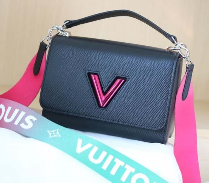 Louis Vuitton Epi Leather Twist MM Handbag In Black With Gradient Strap angle 3