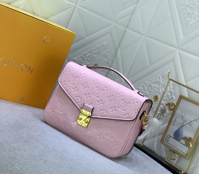 LV Monogram Empreinte Leather Metis In Light Hot Pink angle 2