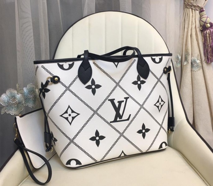 Louis Vuitton Spring 2022 Monogram Empreinte Neverfull MM Tote In Cream angle 3