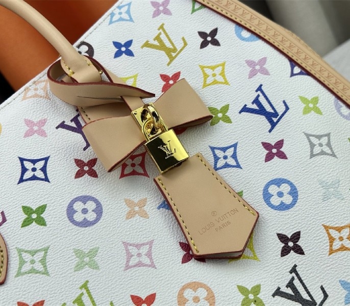 Louis Vuitton X TM Multicolored Onthego MM In White angle 2