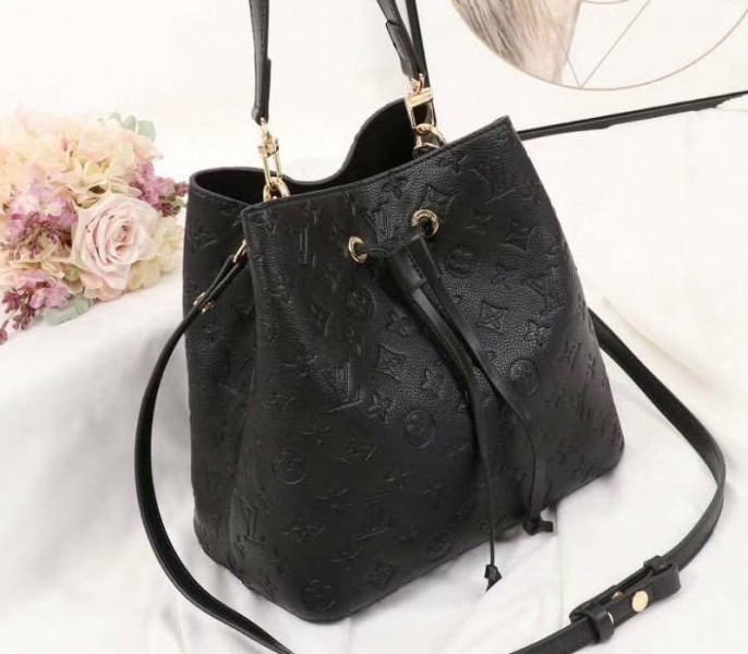Louis Vuitton Monogram Empreinte NeoNoe MM Bag In Black angle 2