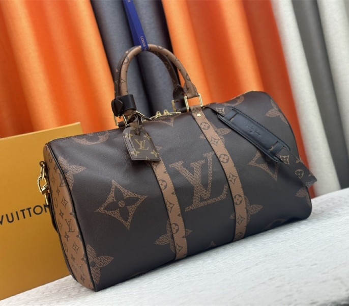 Louis Vuitton Monogram Giant And Monogram Reverse Canvas Keepall Bandouliere 45 angle 2