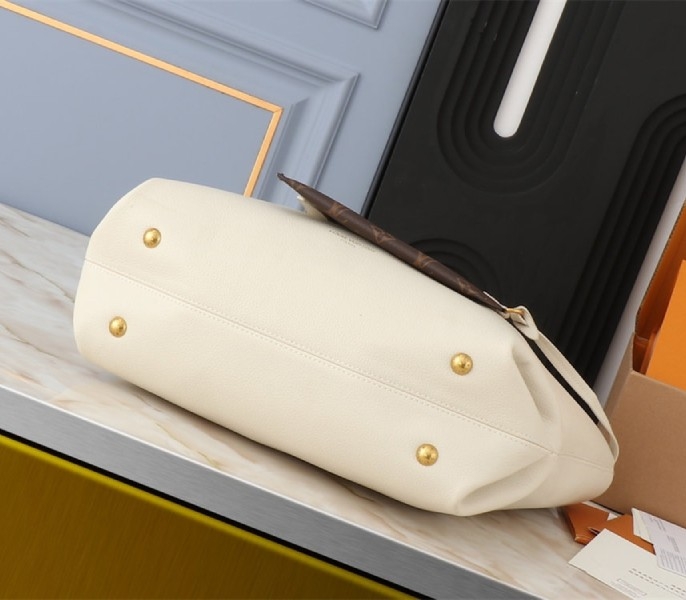 Louis Vuitton Low Key Cabas MM Bag In Quartz White angle 4