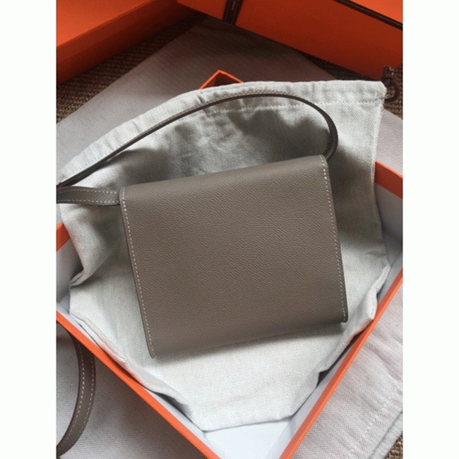 Grey 1:1 replica Hermes Clic wallet with strap angle 4