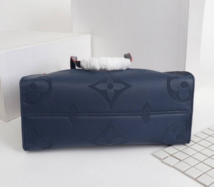 Louis Vuitton Monogram Empreinte Giant Onthego MM Tote In Navy Blue angle 4