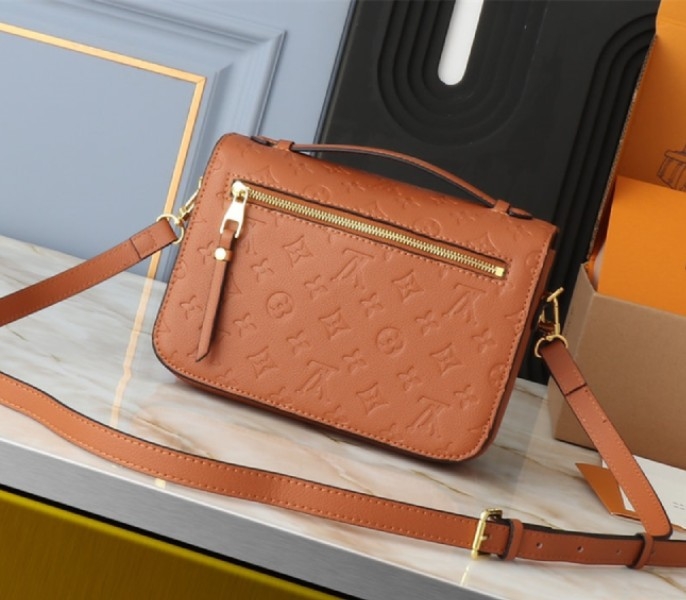 Louis Vuitton Monogram Empreinte Metis Handbag In Cognac Brown angle 2