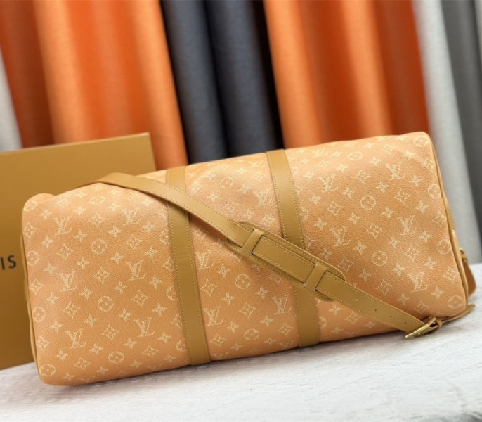 Louis Vuitton Monogram Heritage Canvas Keepall Bandouliere 50 In Yellow angle 5