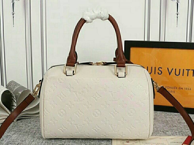 Louis Vuitton Monogram Empreinte Speedy Bandouliere 25 Handbag In Cream angle 3