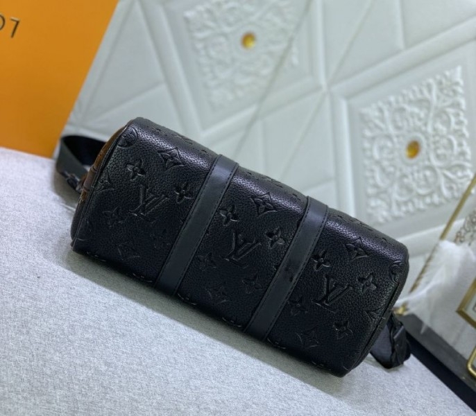 Louis Vuitton Taurillon Monogram Leather Keepall Bandouliere 25 In Black angle 5