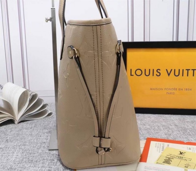 Louis Vuitton Monogram Empreinte Neverfull MM Tote In Beige angle 4