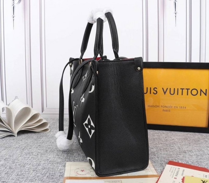 Louis Vuitton Monogram Empreinte OnTheGo MM Tote In Black angle 3