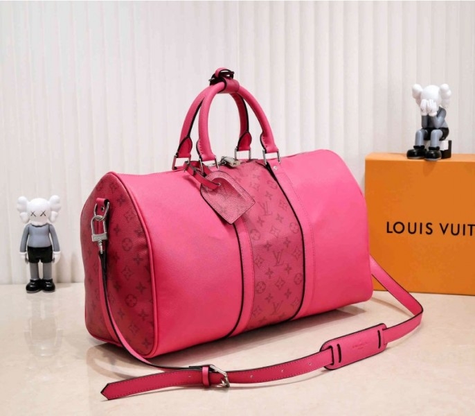Louis Vuitton Taiga Leather Keepall Bandouliere 50 Travel Bag In Pink angle 2