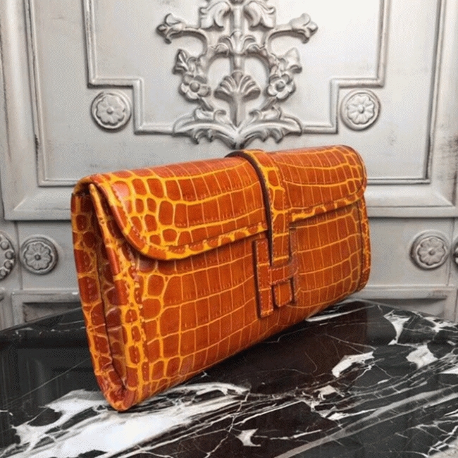 Orange crocodile leather knockoff Hermes Jige Elan clutch bag angle 2