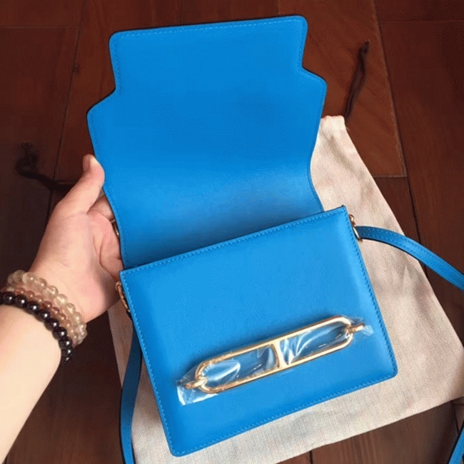 Blue hydra luxury replica Hermes Mini Sac Roulis handbag angle 3