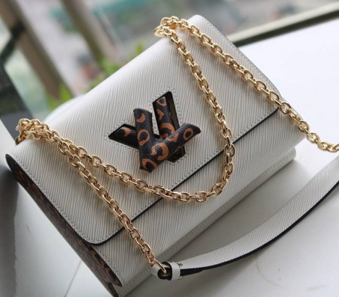 Louis Vuitton Epi Leather Jungle Edition Twist MM Bag In Optic White angle 3