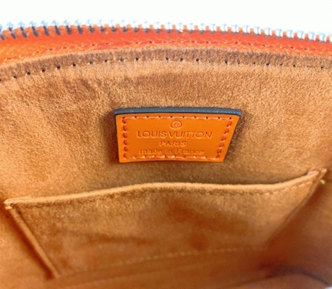 Louis Vuitton Epi Leather Alma BB Handbag In Orange With Jacquard Strap angle 3
