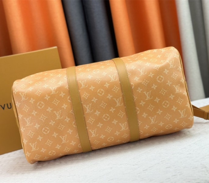 Louis Vuitton Monogram Heritage Canvas Keepall Bandouliere 45 In Yellow angle 4