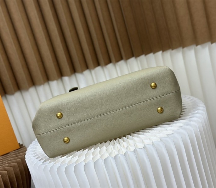 Louis Vuitton Low Key Cabas MM Bag In Limestone Gray angle 4