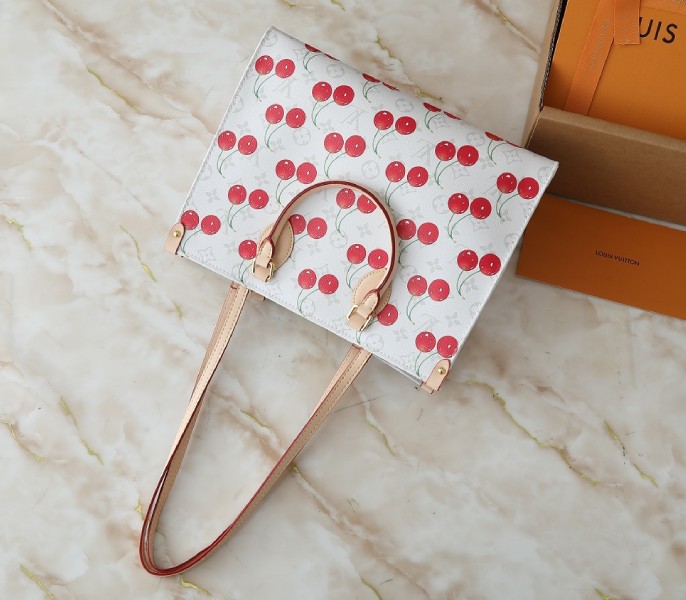 X TM Monogram Cherry Canvas Onthego MM In White Style 1 angle 5