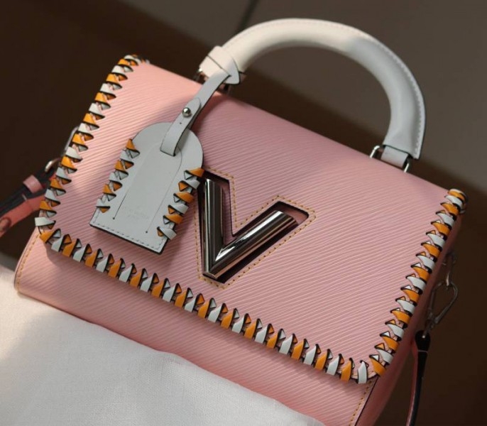 Louis Vuitton Epi Leather Twist MM Bag In Rose Bellerin Pink With Braided Edges Flap angle 3