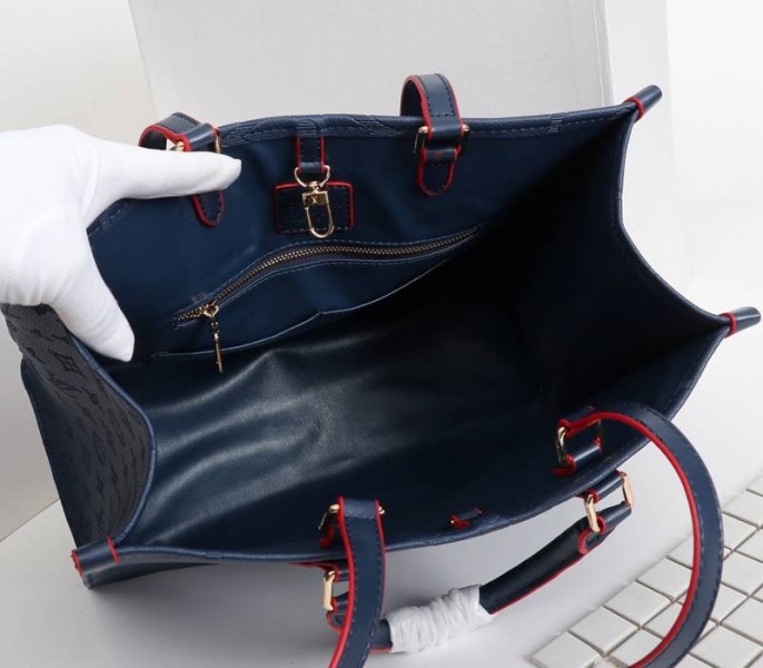 Louis Vuitton Monogram Empreinte Giant Onthego MM Tote In Navy Blue angle 5