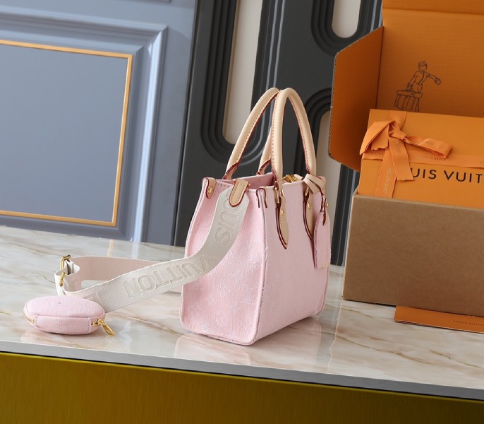 Monogram Denim OnTheGo PM In Washed Pink angle 2