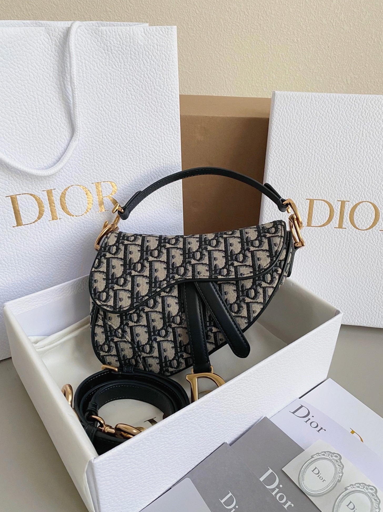 Dior Mini Saddle Bag Fake with Strap in Blue Oblique Jacquard angle 2