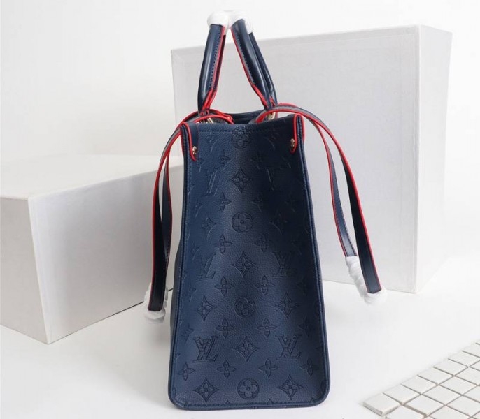 Louis Vuitton Monogram Empreinte Giant Onthego MM Tote In Navy Blue angle 3