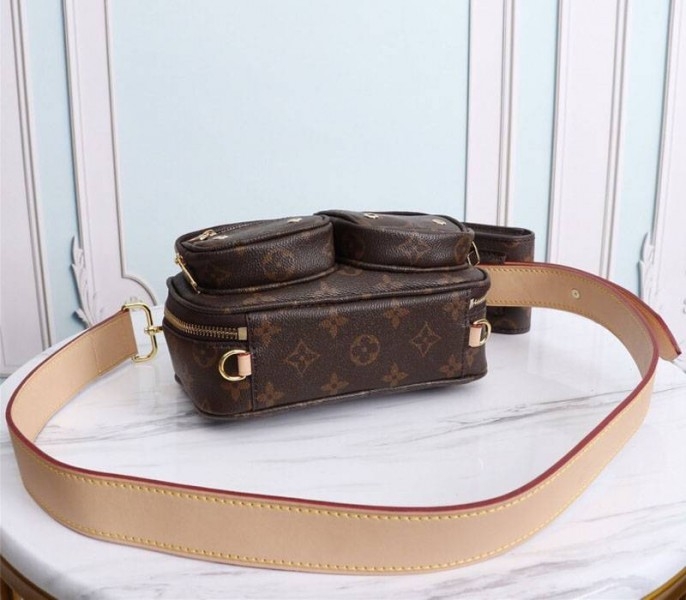 Louis Vuitton Monogram Canvas Utility Bag angle 4