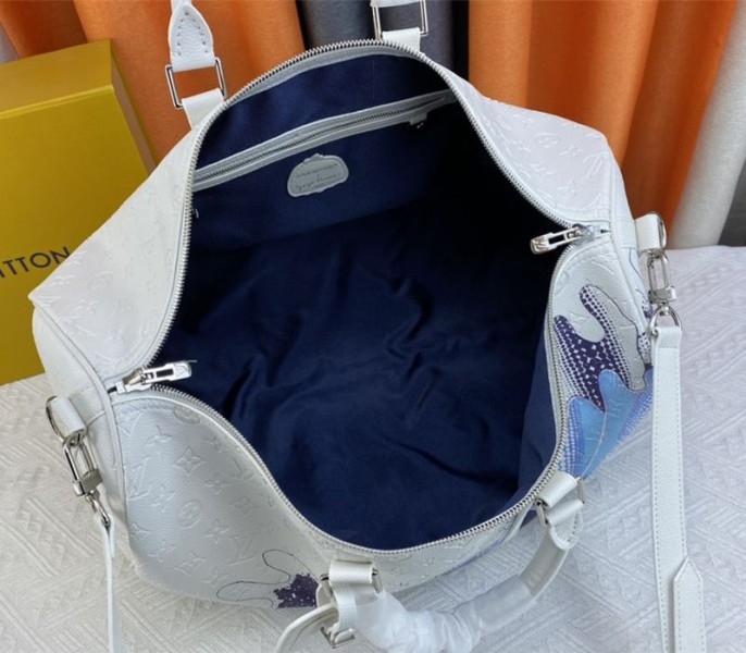 Louis Vuitton X YK Bandouliere Keepall 50 Travel Bag In White angle 4